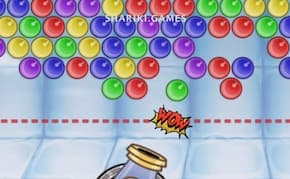 В игре Бабл шутер стреляйте пушкой в скопление цветных шариков